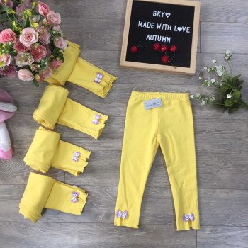 Quần legging nỉ da cá chun xe gấu nơ - vàng Quần legging nỉ da cá chun xe gấu nơ - vàng